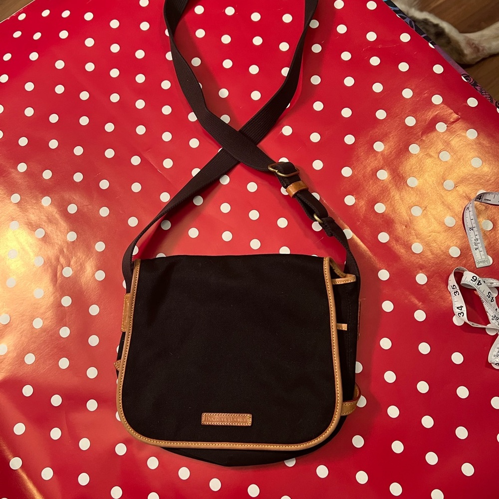 Dooney & Bourke Black and Tan Crossbody Bag with Classic Design
